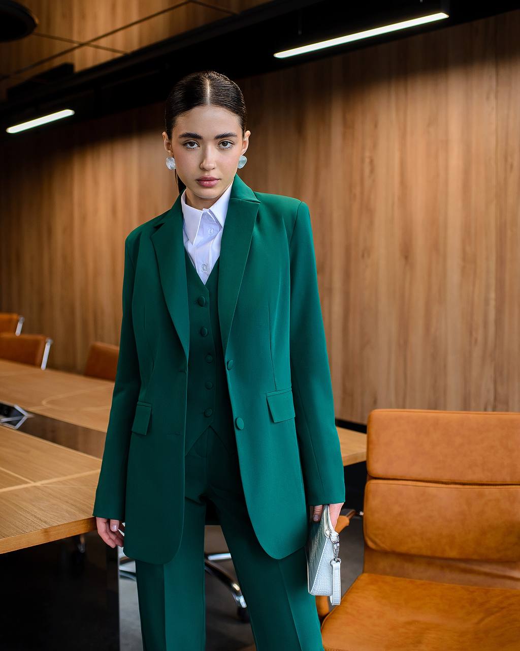 Green three-piece suit with waistcoat and straight trousers