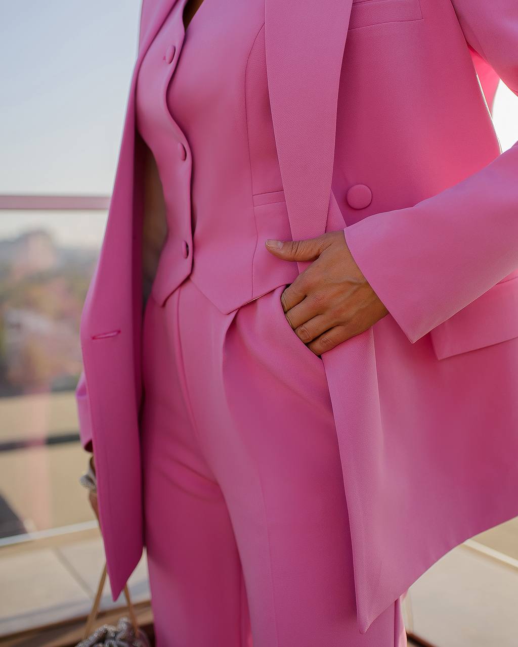 Pink three-piece suit with vest