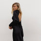 Black midi dress with bow and open back