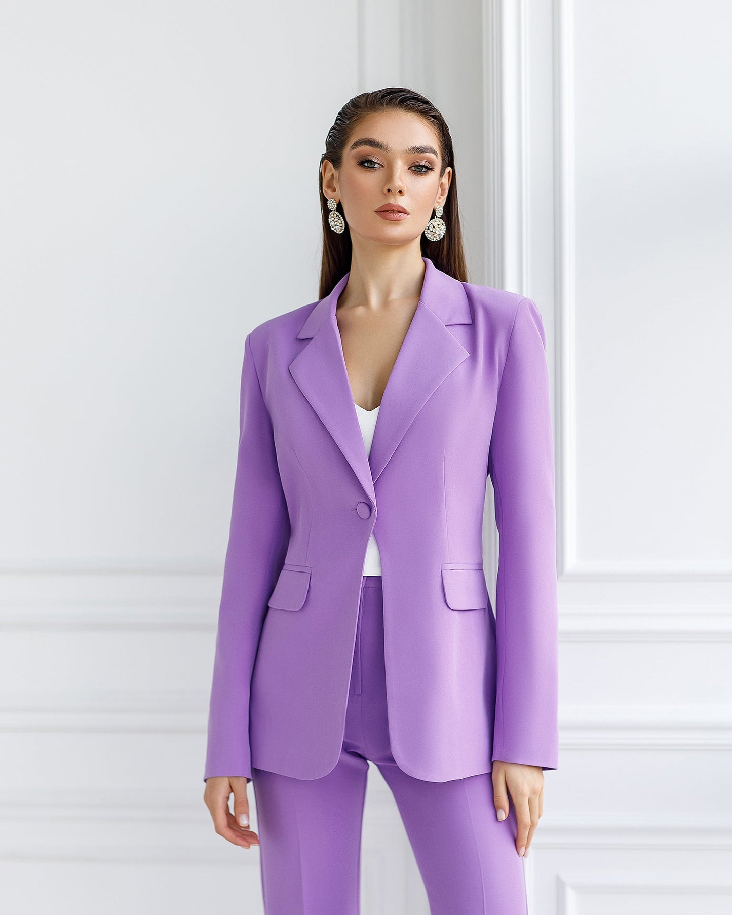 Purple suit jacket and flared pants with slits