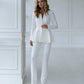 Milk suit with a peplum jacket and tapered trousers