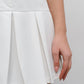 Milk pleated mini skirt