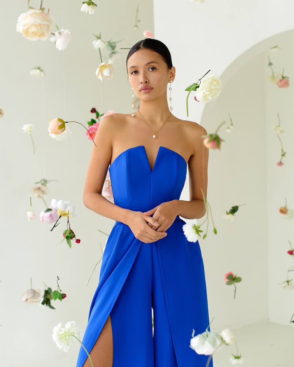 Blue corset jumpsuit with slits