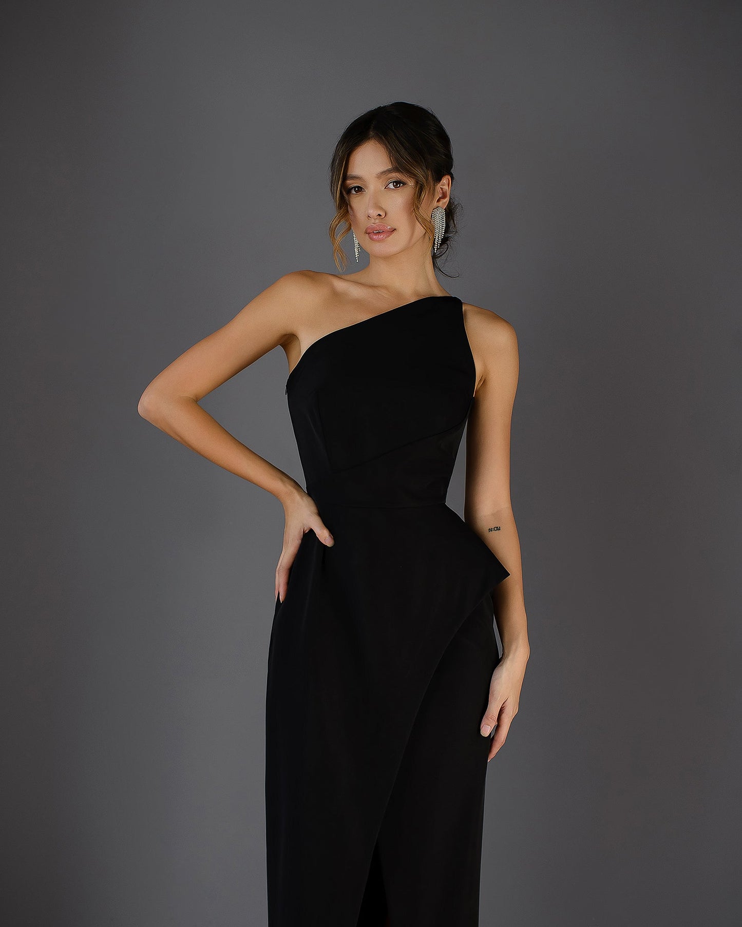 Black cocktail dress with a slit 