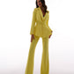 A yellow suit with a peplum jacket and flared pants