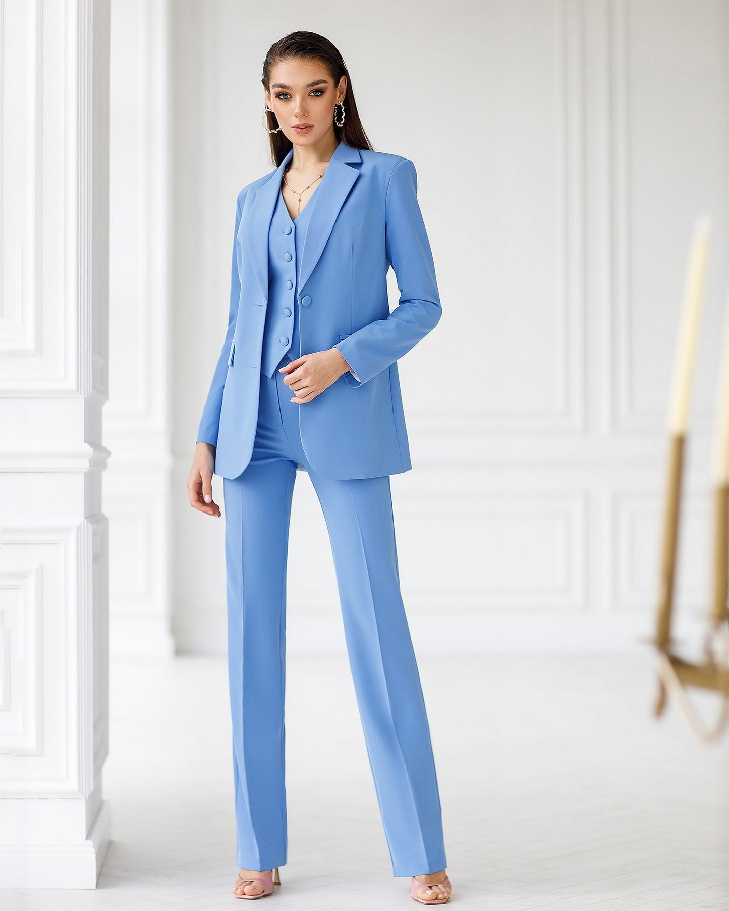 Blue three-piece suit with waistcoat and straight trousers