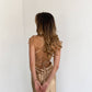 Beige dress-combination with an open back