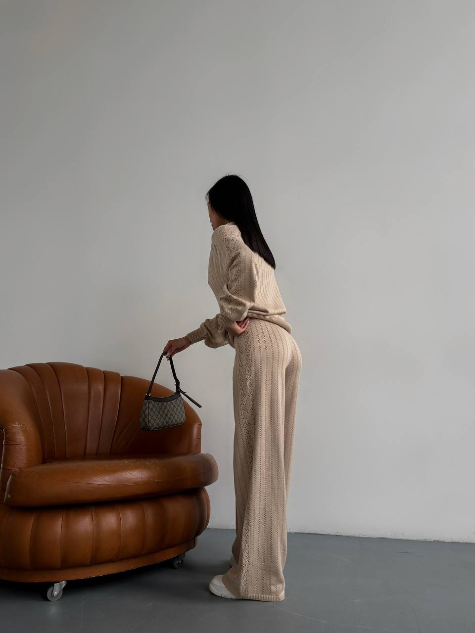 Beige knitted suit