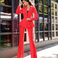 A red suit with a peplum jacket and flared pants