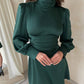 Emerald mini dress with open back and bow