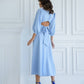 Blue midi dress with a full skirt and a bow