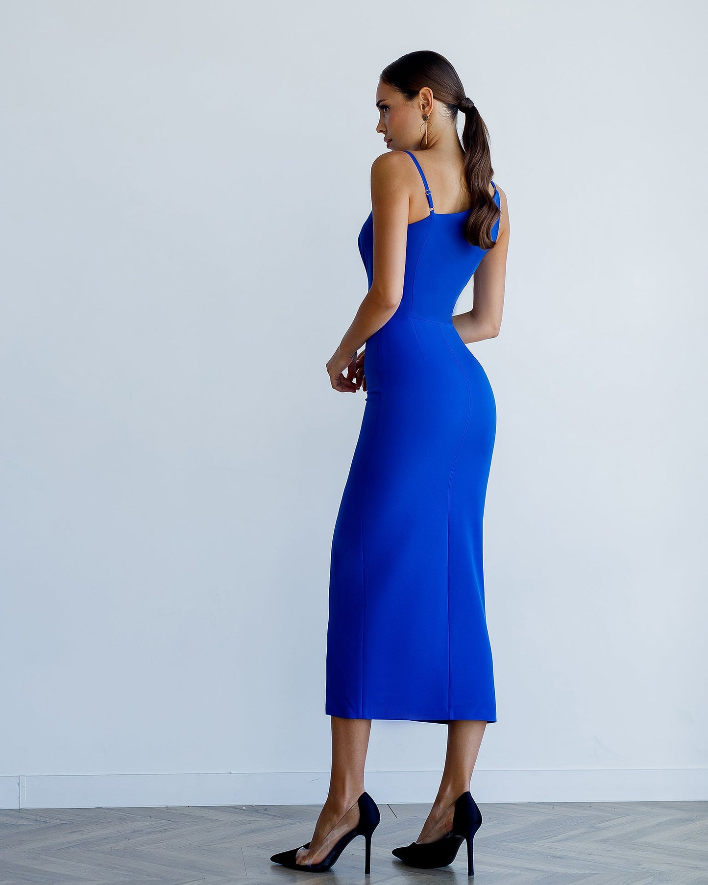 Blue dress of asymmetrical cut 