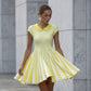 Yellow knitted mini dress in stripes