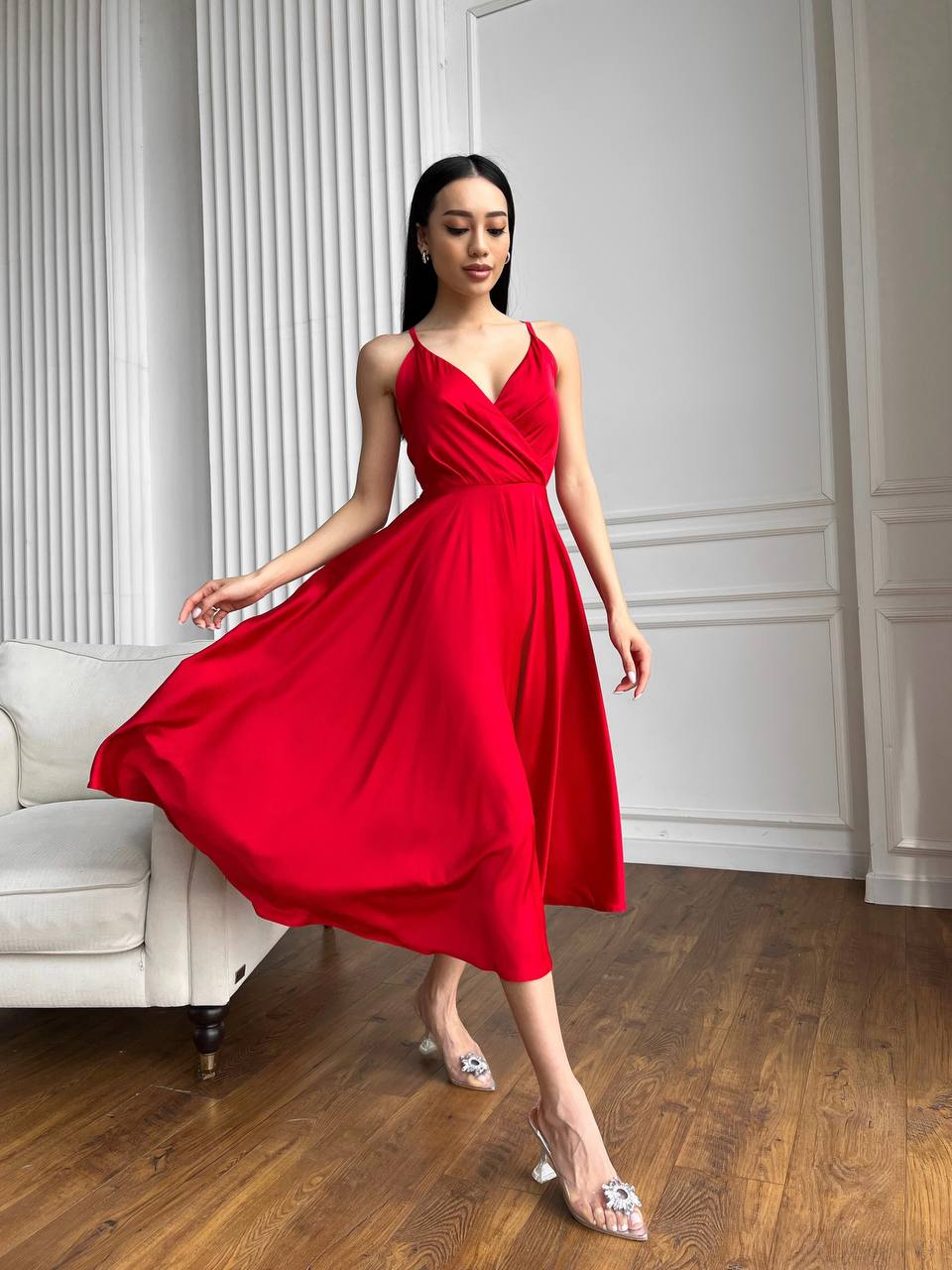 Red dress with an open back and a lush skirt