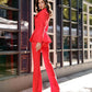 A red suit with a peplum jacket and flared pants