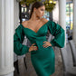 Green satin dress with voluminous sleeves