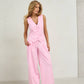 Soft pink suit for two with a vest