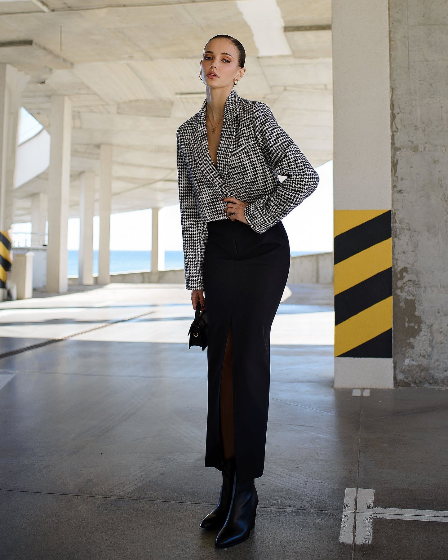 Black pencil skirt with a slit