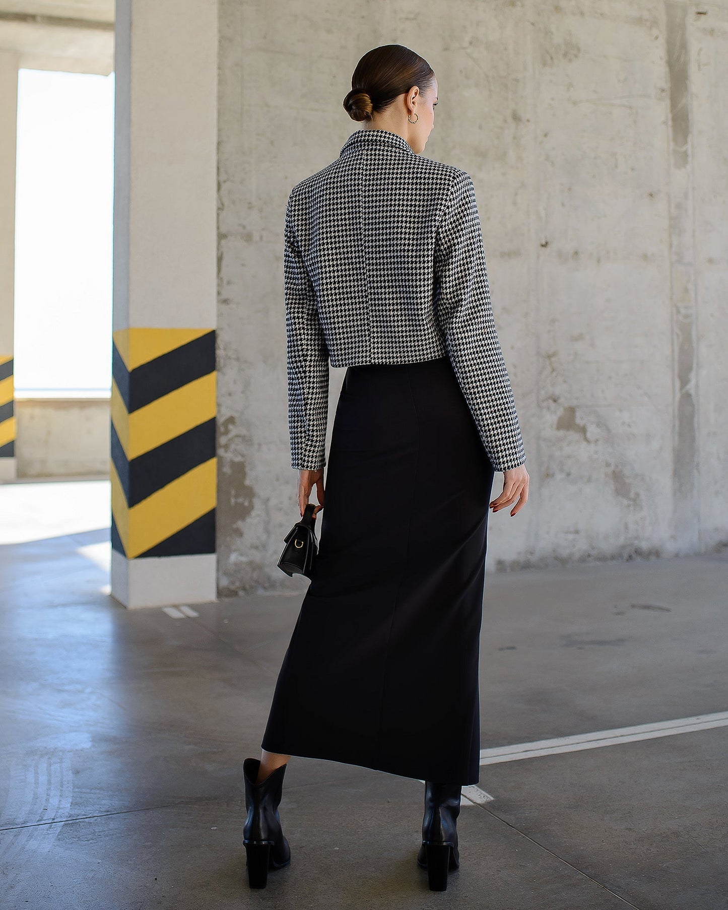 Black pencil skirt with a slit