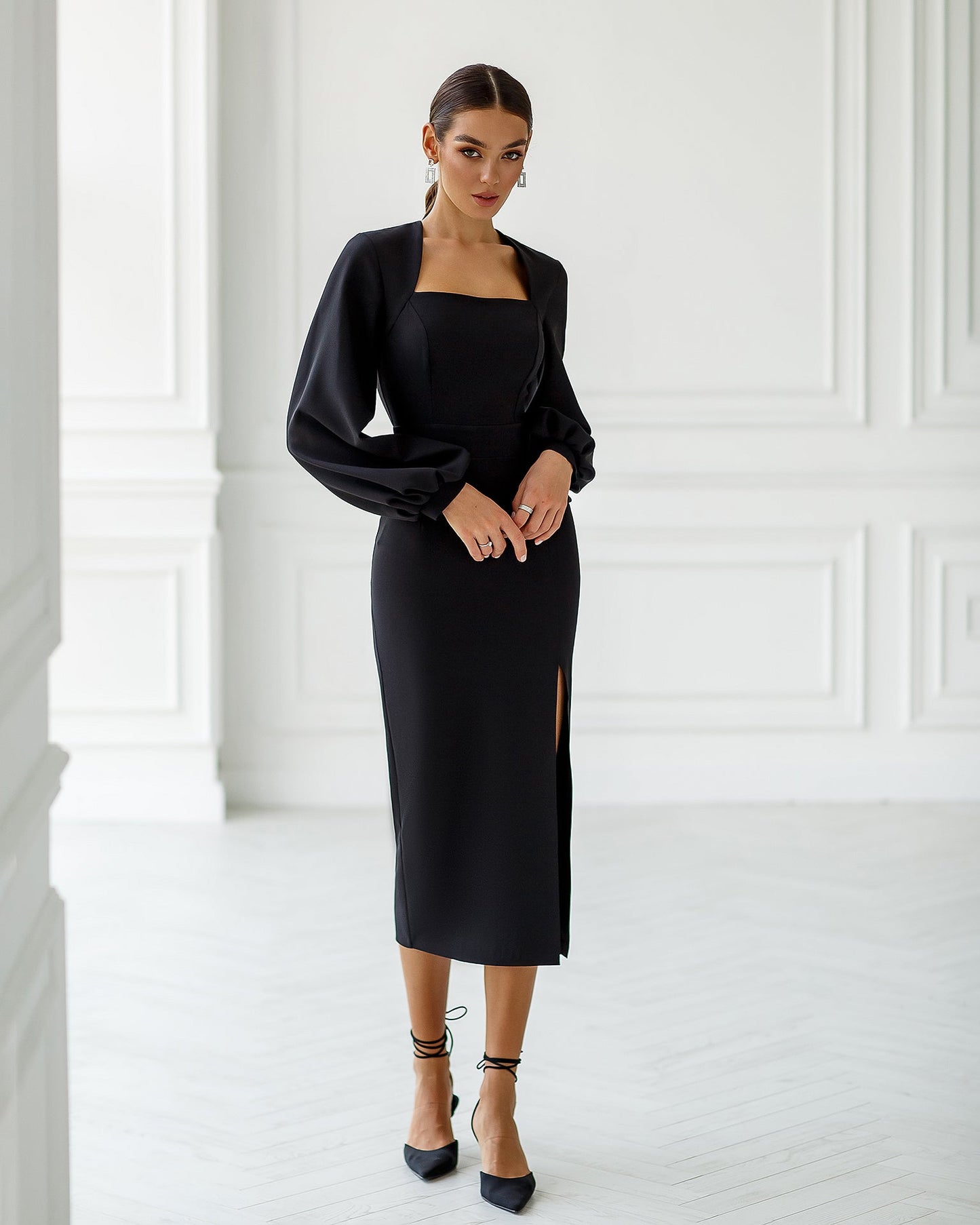 Black silhouette dress with a slit