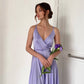 Lavender dress with an open back and a lush skirt