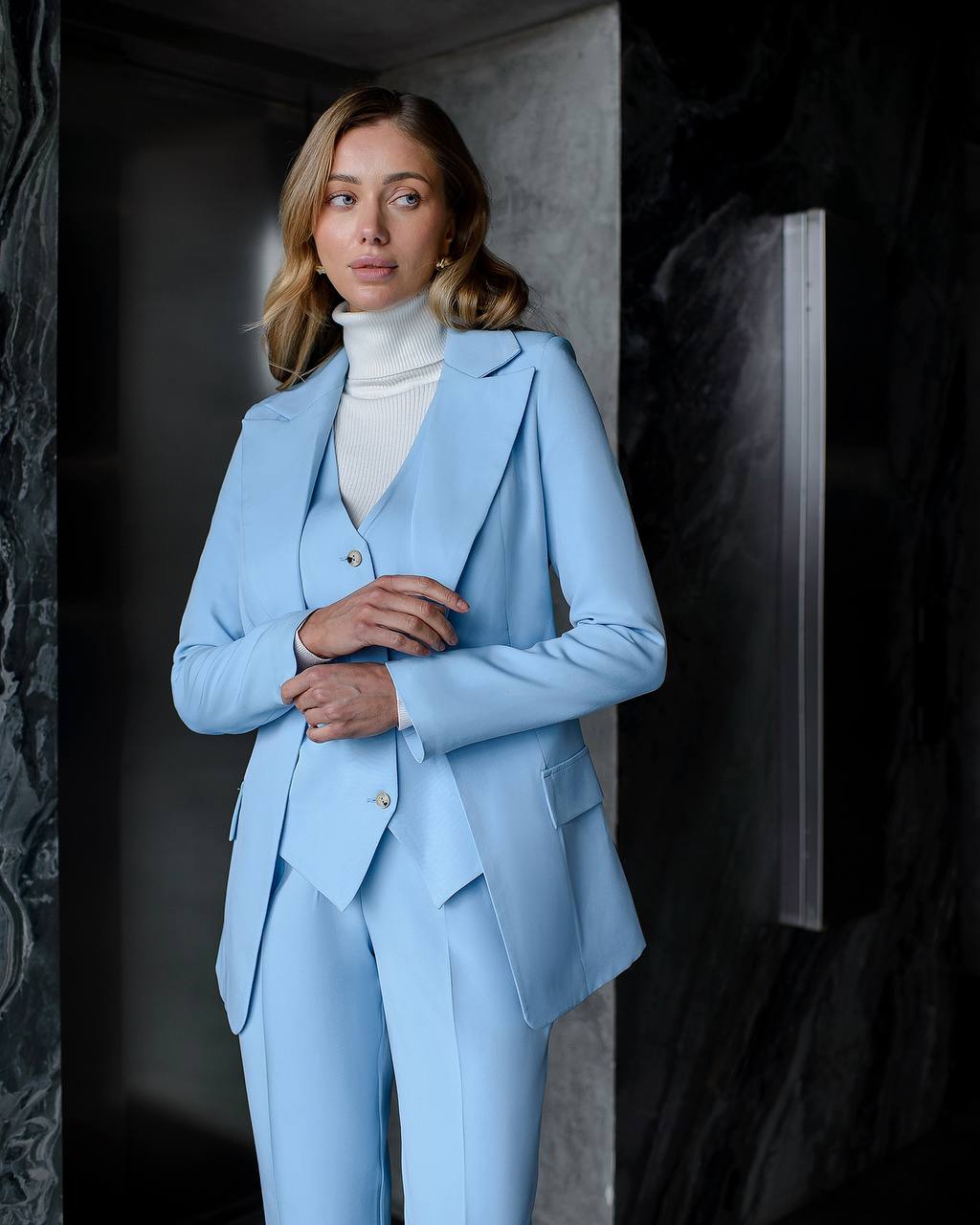 Blue three-piece suit with vest