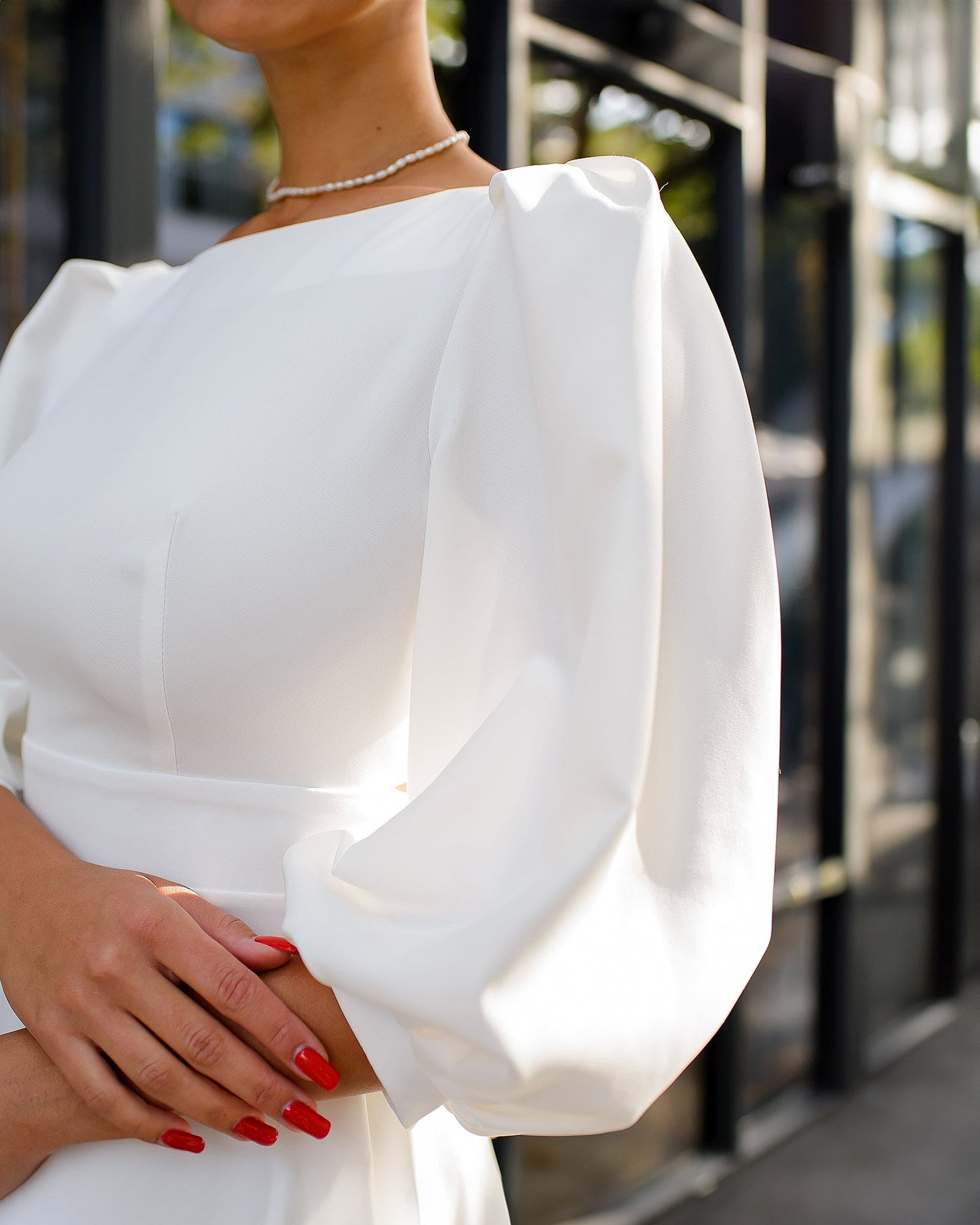 Milk dress with a lush skirt and a bow