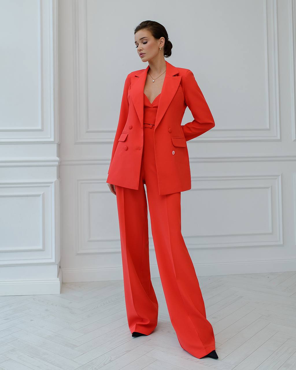 Three-piece coral suit with a top