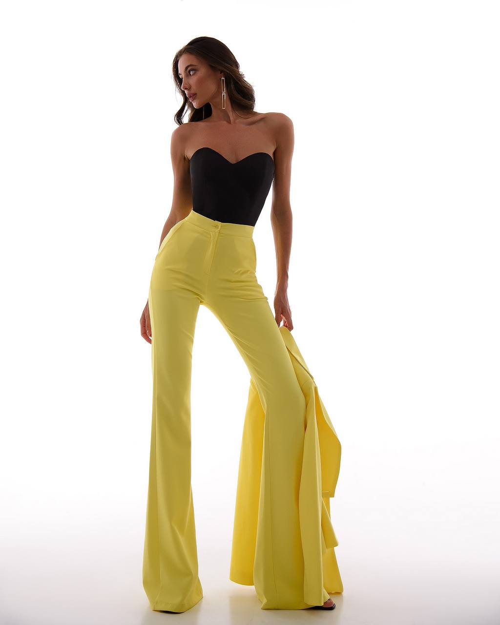 A yellow suit with a peplum jacket and flared pants