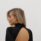 Black midi dress with bow and open back