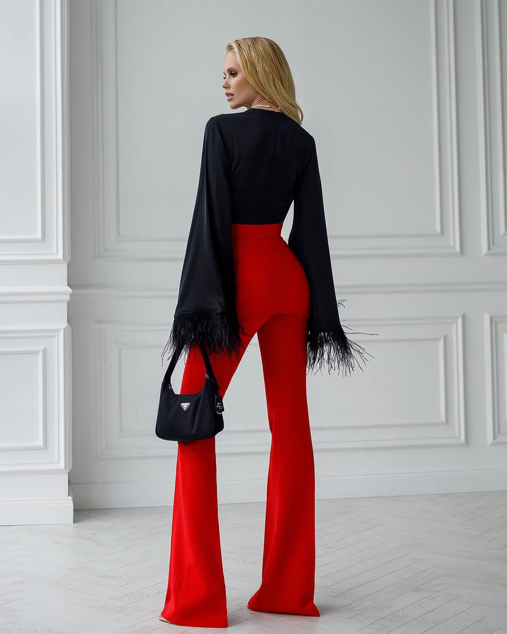 Red flared pants with a super high fit