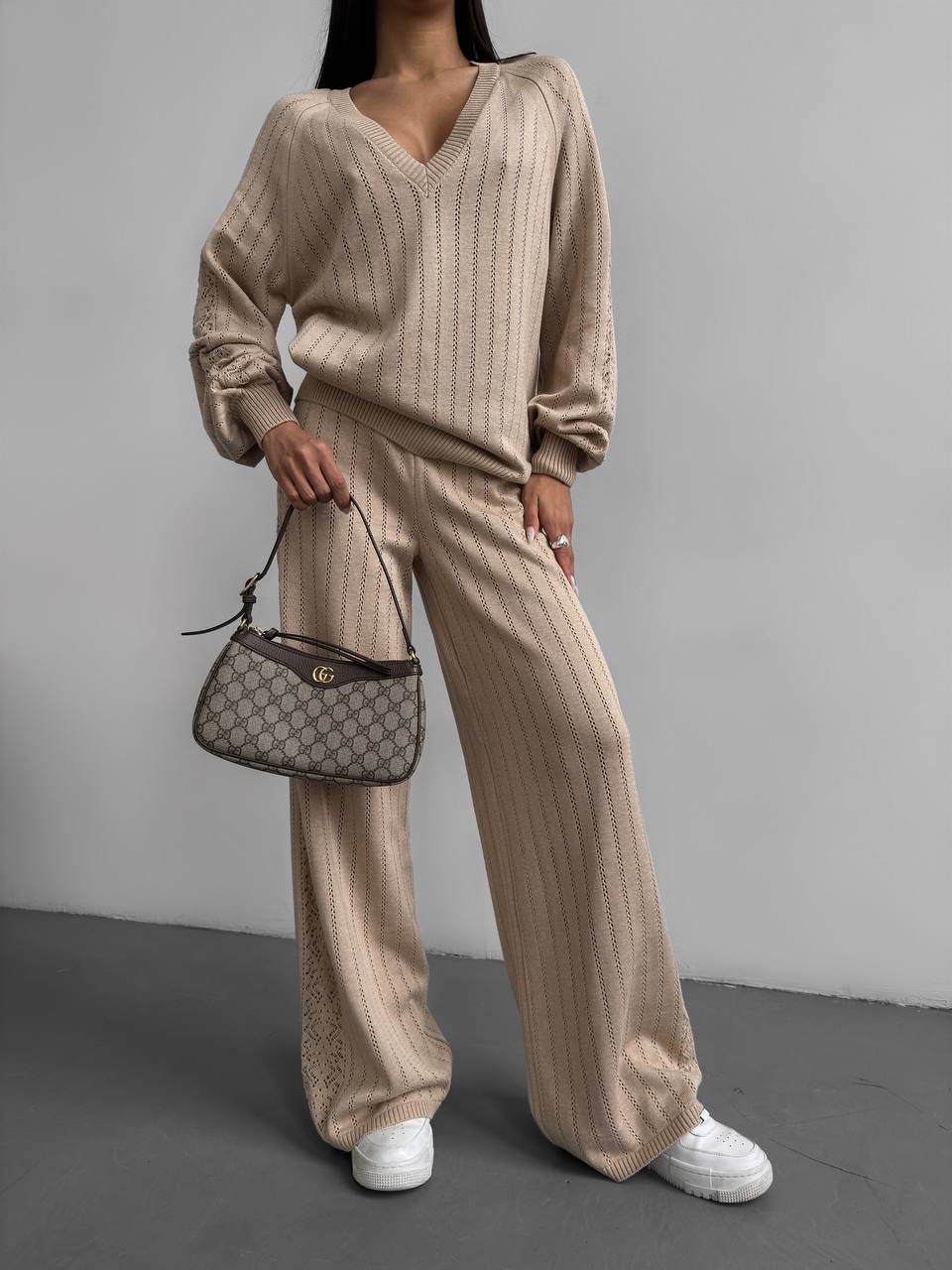 Beige knitted suit