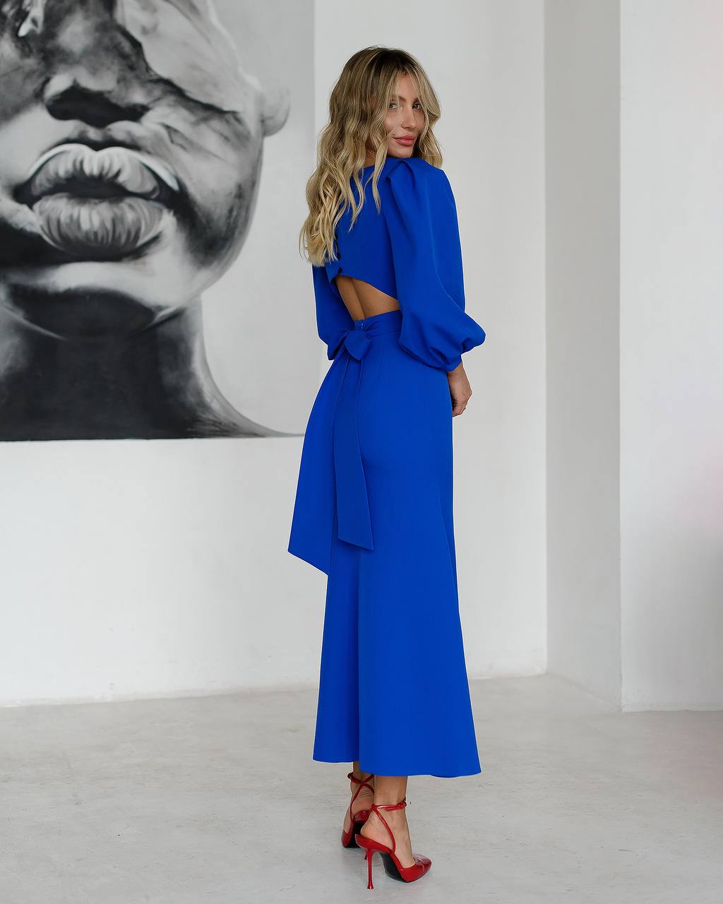 Blue midi dress with an open back