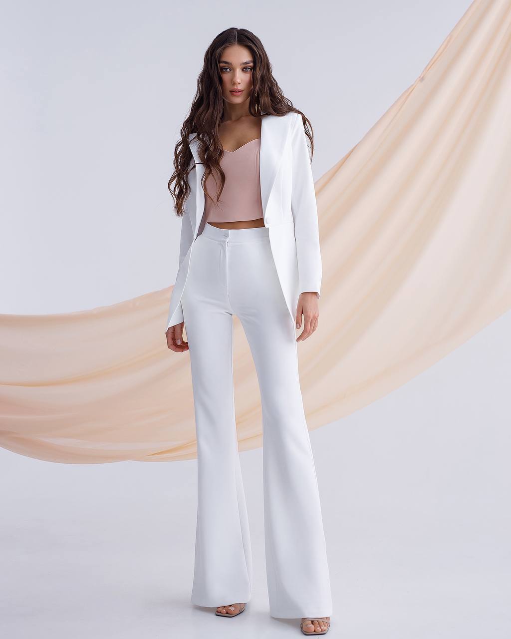 Milk suit with a peplum jacket and flared pants