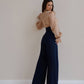 Dark blue palazzo pants with a corset belt