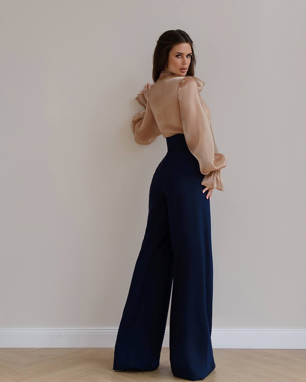 Dark blue palazzo pants with a corset belt