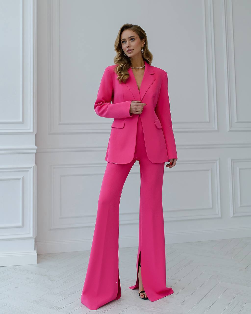 Crimson suit jacket and flared pants with slits