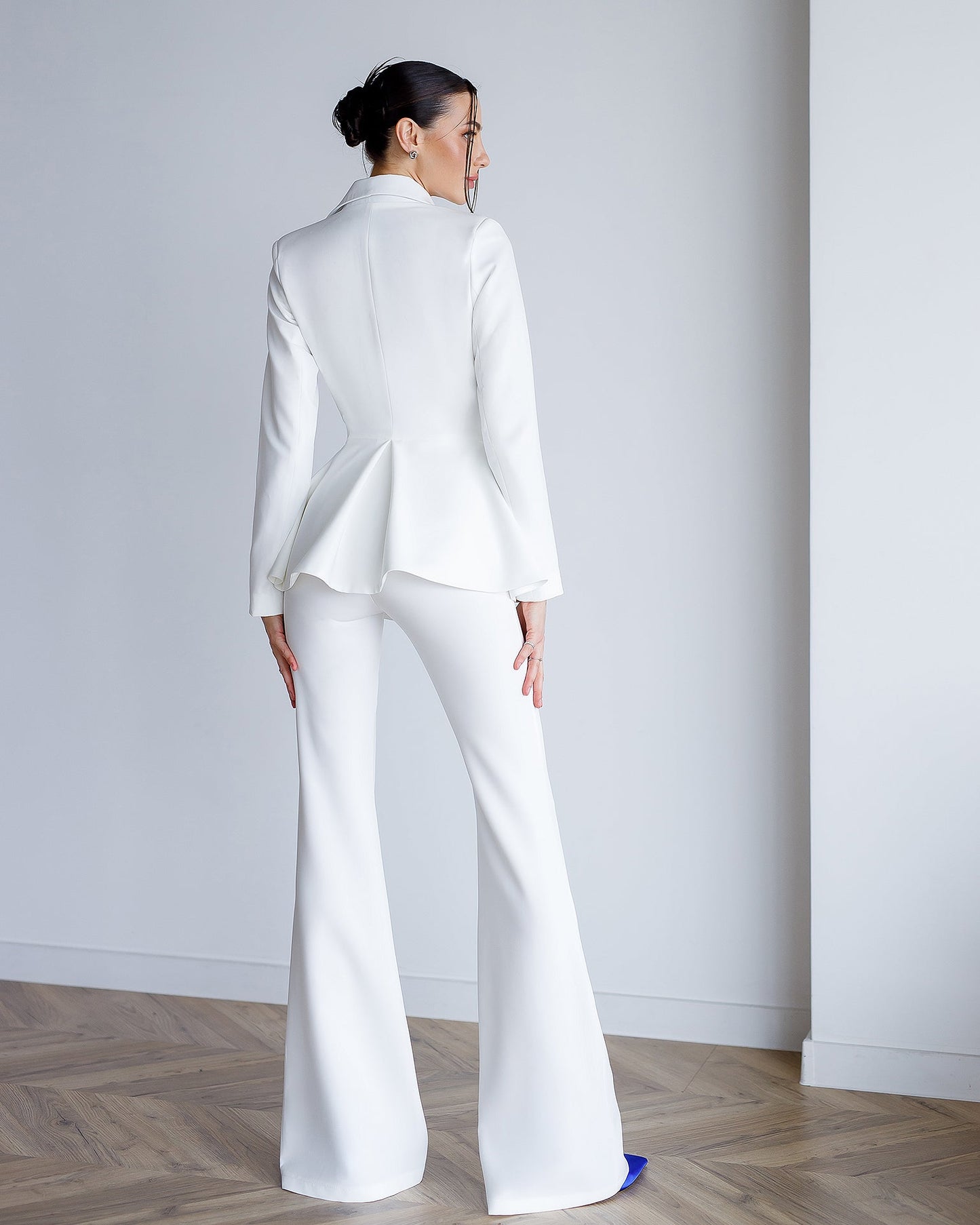 Milk suit with a peplum jacket and flared pants