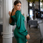 Green satin dress with voluminous sleeves