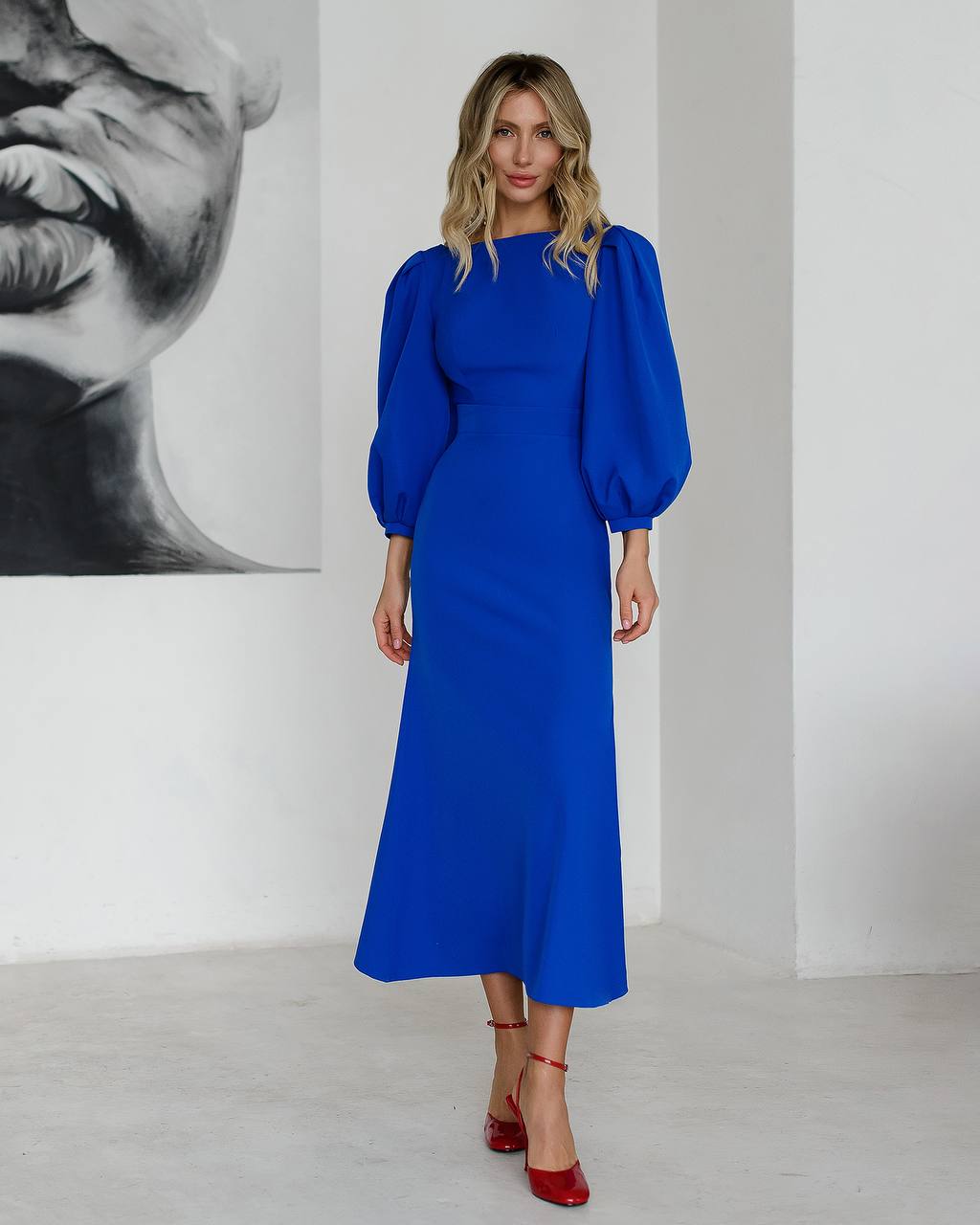 Blue midi dress with an open back