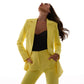 A yellow suit with a peplum jacket and flared pants