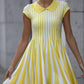 Yellow knitted mini dress in stripes