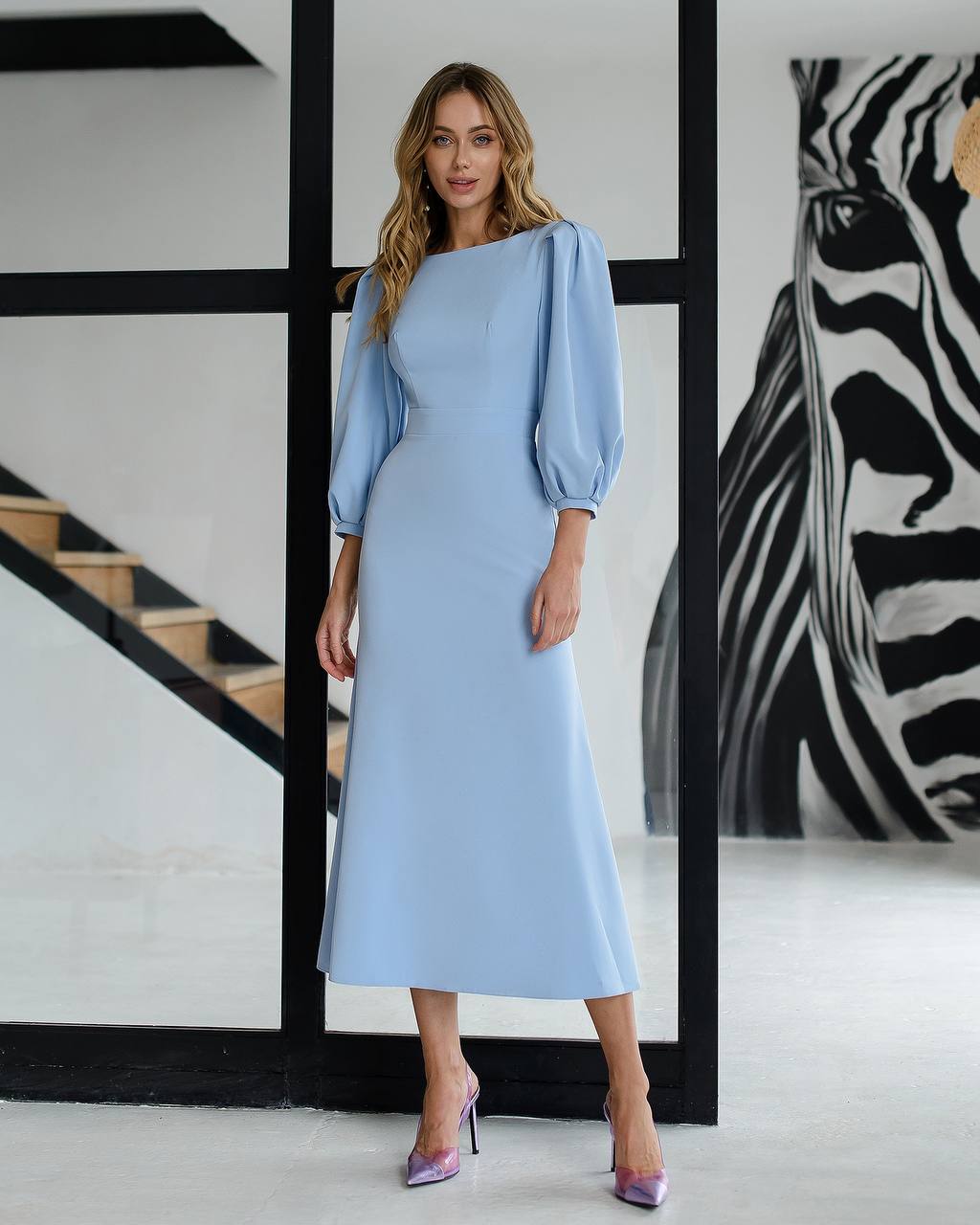 Blue midi dress with an open back