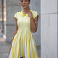 Yellow knitted mini dress in stripes