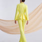 A yellow suit with a peplum jacket and flared pants