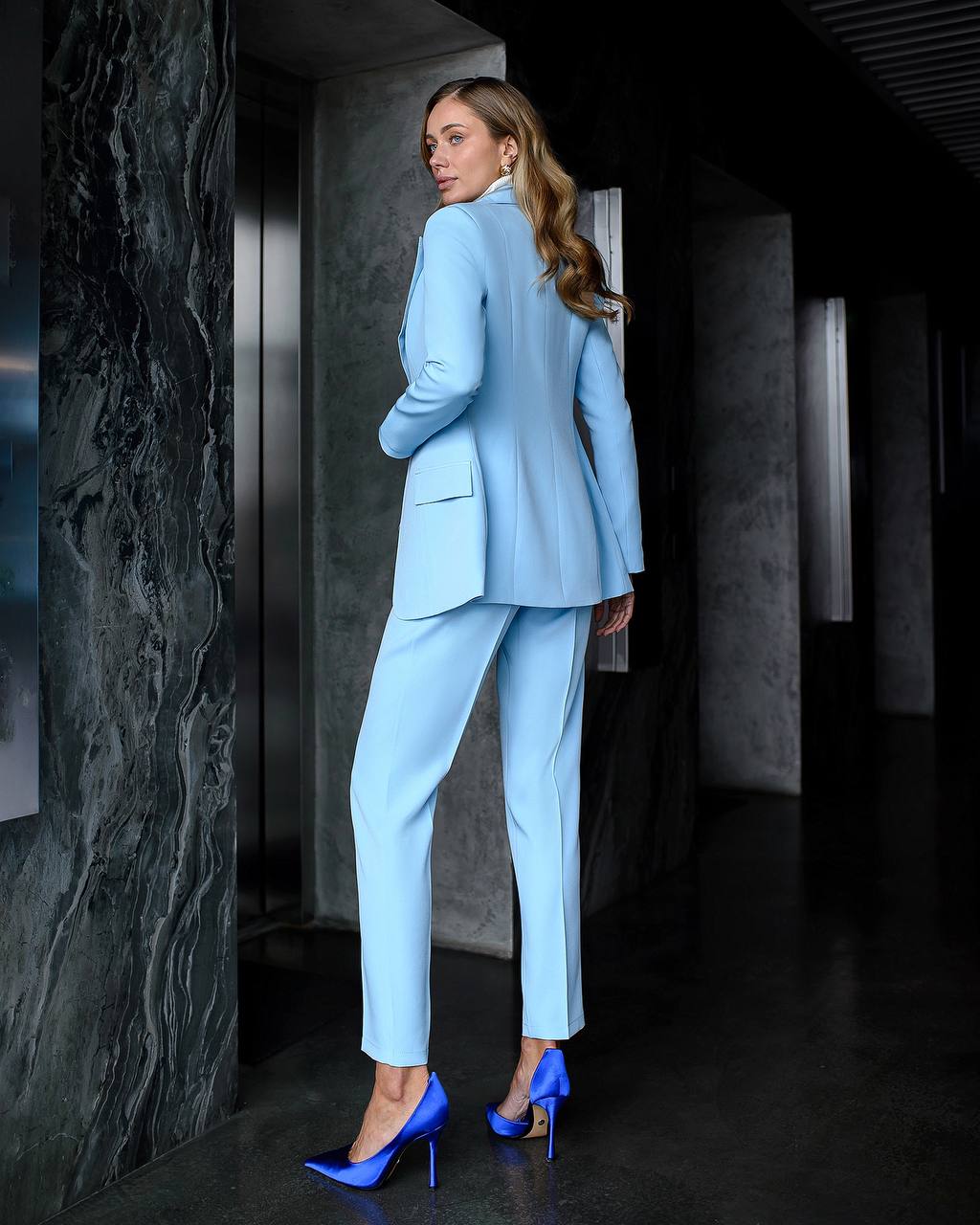 Blue three-piece suit with vest