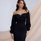 Black dress with voluminous sleeves