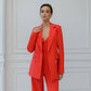 Three-piece coral suit with a top