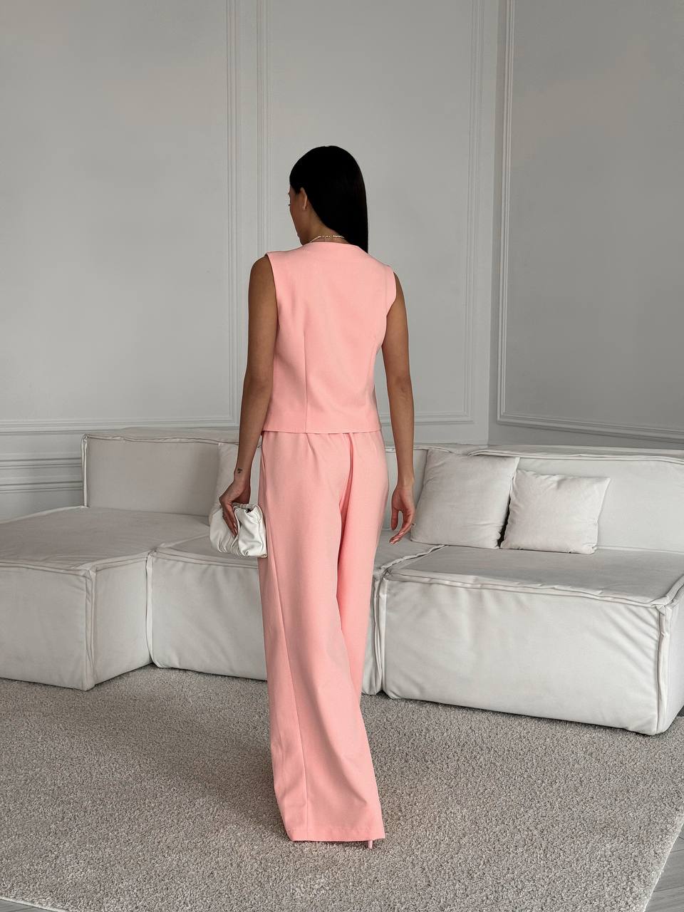 Peach suit for two with a vest