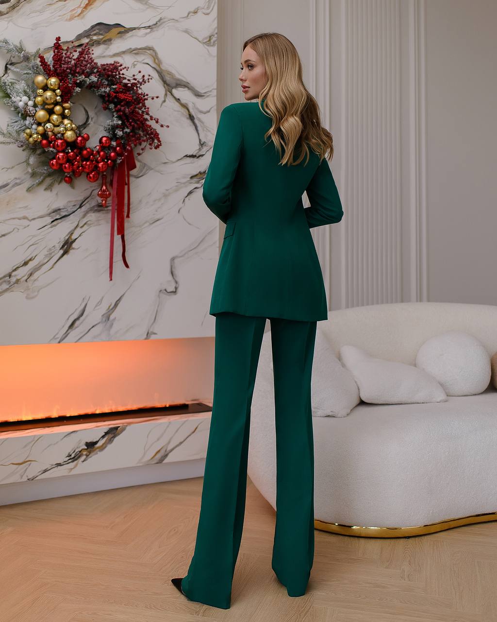 Green three-piece suit with waistcoat and straight trousers